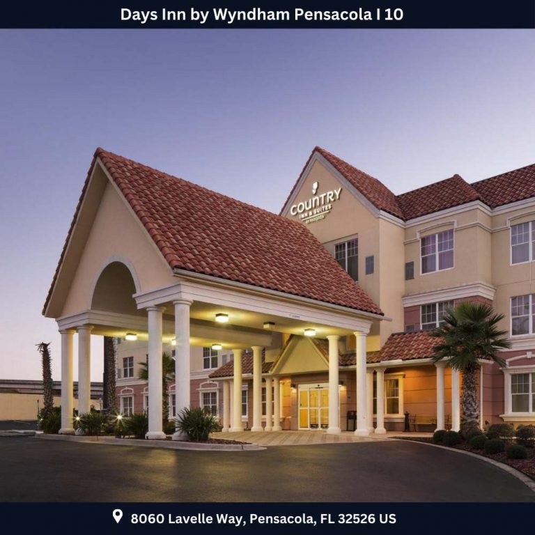 The inviting entrance of Country Inn & Suites by Wyndham Preston, showcasing a charming facade and friendly ambiance.