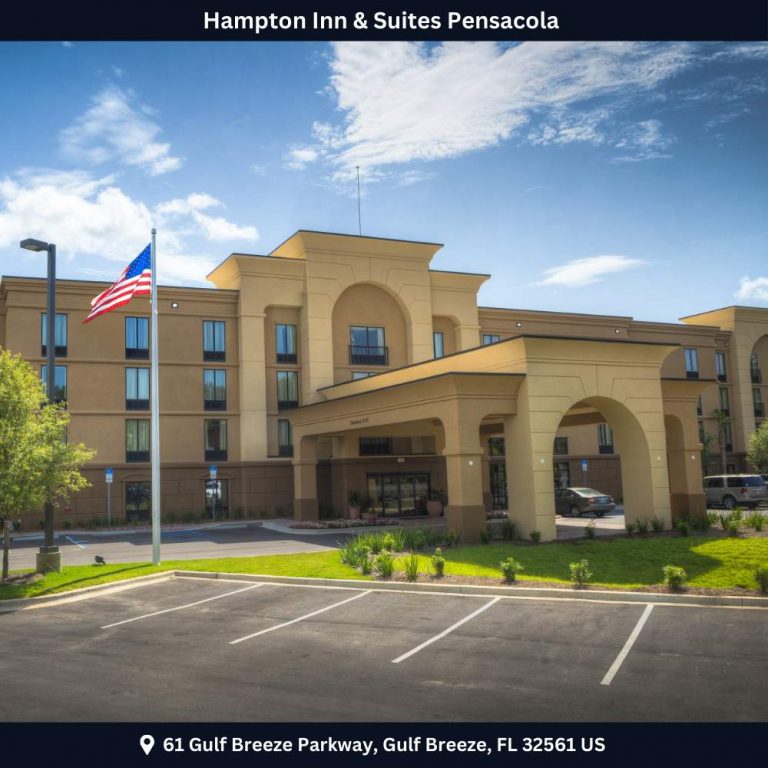 Hampton Inn & Suites in Port St. Lucie, featuring a stylish facade and inviting atmosphere for travelers.