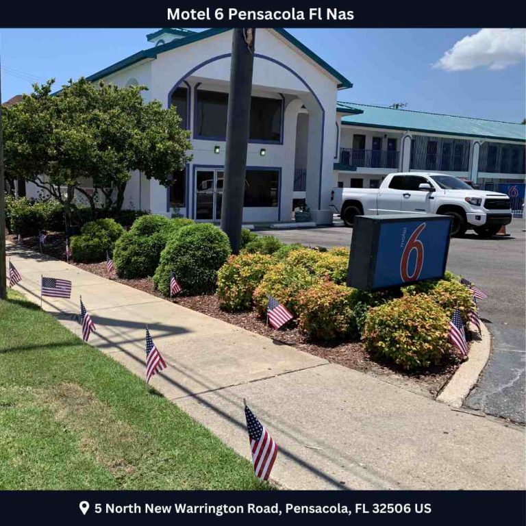 Exterior view of Motel 6 & Suites in Florida Keys, showcasing a welcoming entrance and vibrant surroundings.