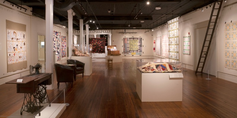 The Gadsden Arts Center & Museum features various styles and mediums of artwork displayed in an elegant setting.