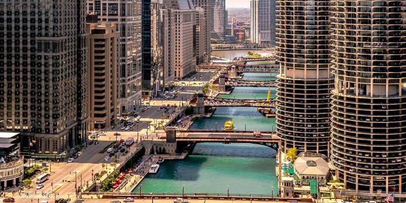 A view of the Chicago River with the iconic downtown skyline in the background.