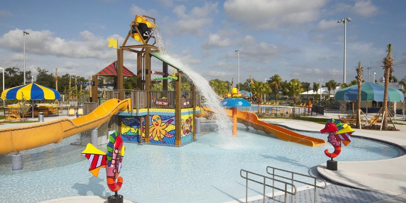 Grapeland Water Park showcases a fun-filled water slide, inviting guests to enjoy a refreshing day of aquatic activities.