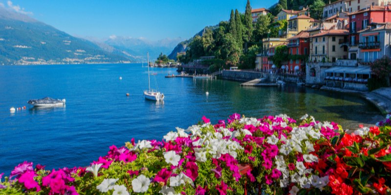 Scenic Lake Como in Italy, featuring tranquil waters and picturesque landscapes framed by majestic hills.