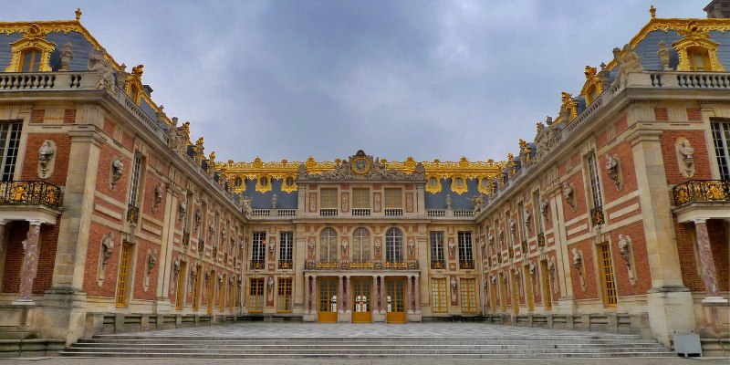 The Main Palace of Versailles, showcases its grand architecture and expansive gardens, a symbol of French royal heritage.