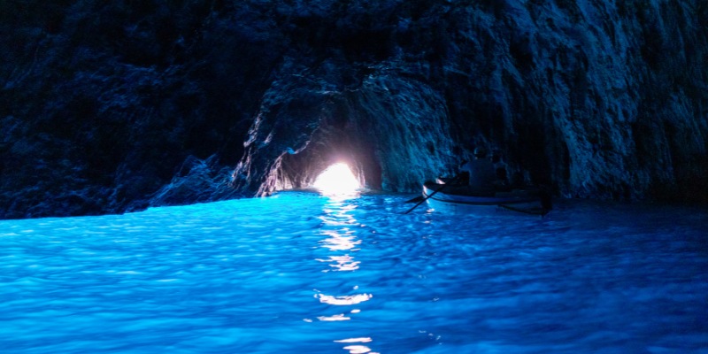 The enchanting Blue Cave in Capri, featuring luminous blue waters and striking natural rock formations.