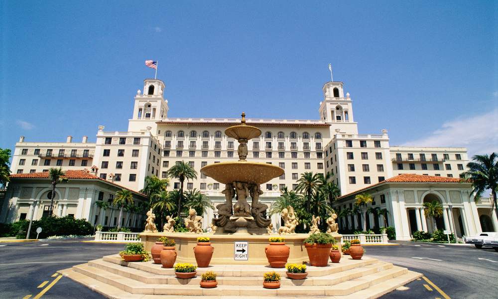 The Breakers Palm Beach Hotel is an iconic luxury hotel in West Palm Beach, Florida, featuring stunning architecture and gardens.