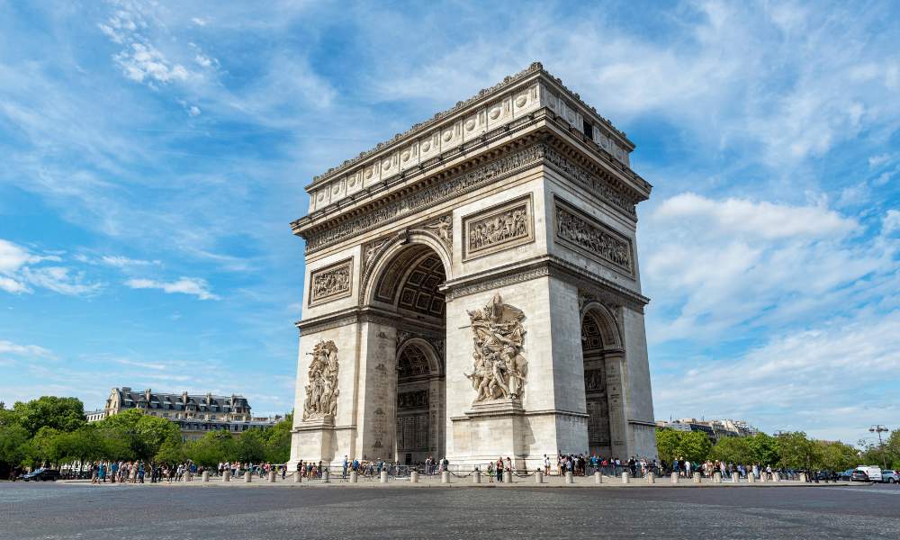 The Arc de Triomphe stands majestically in Paris, one of the city's top ten tourist attractions