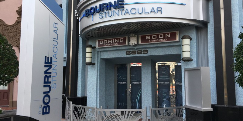 Entrance view of the Bourne Solarium at Disney's Hollywood Studios, highlighted by eye-catching decorations and signage.