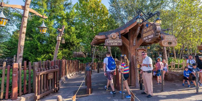 Entrance to the Jungle Cruise at Disneyland, featuring the Lightning Lane sign for quick access to the attraction.