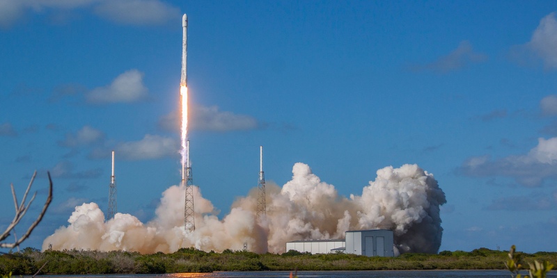 SpaceX's Falcon 9 rocket lifts off from pad 39A at Kennedy Space Center, marking a significant moment in space exploration.