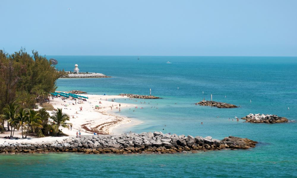 Calm waters at Fort Zachary Taylor State Park, invite visitors to enjoy nature and recreational activities.