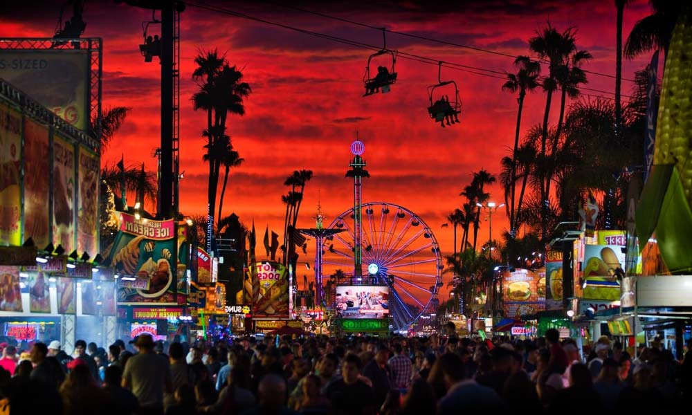 Fantastic view of the Los Angeles festivals, brightly lit against a dramatic red sky.