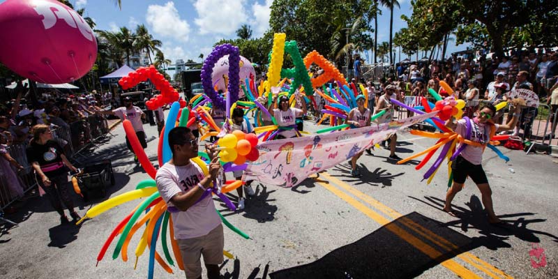 Performers in colorful costumes at the Miami Carnival Parade & Concert.