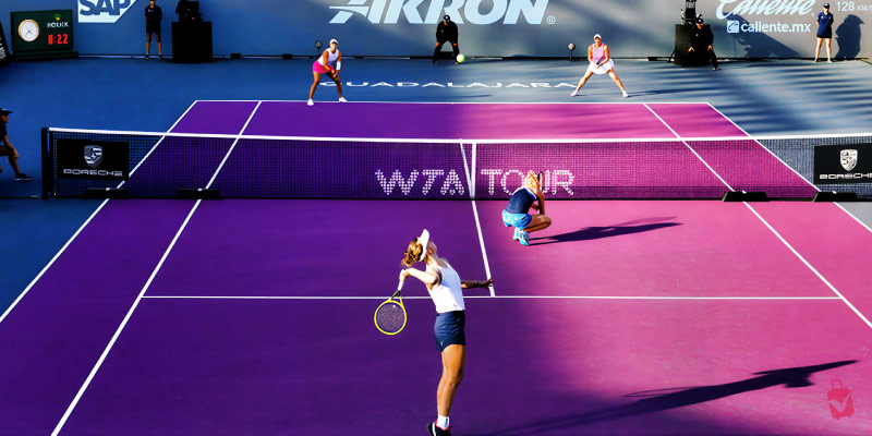 Professional female tennis players compete on a vibrant purple court during the GDL Open AKRON (WTA 500) tournament in Guadalajara.